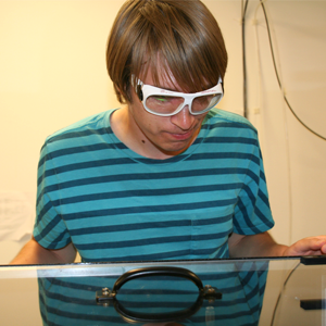 photo of Andrew Savinov in the laboratory