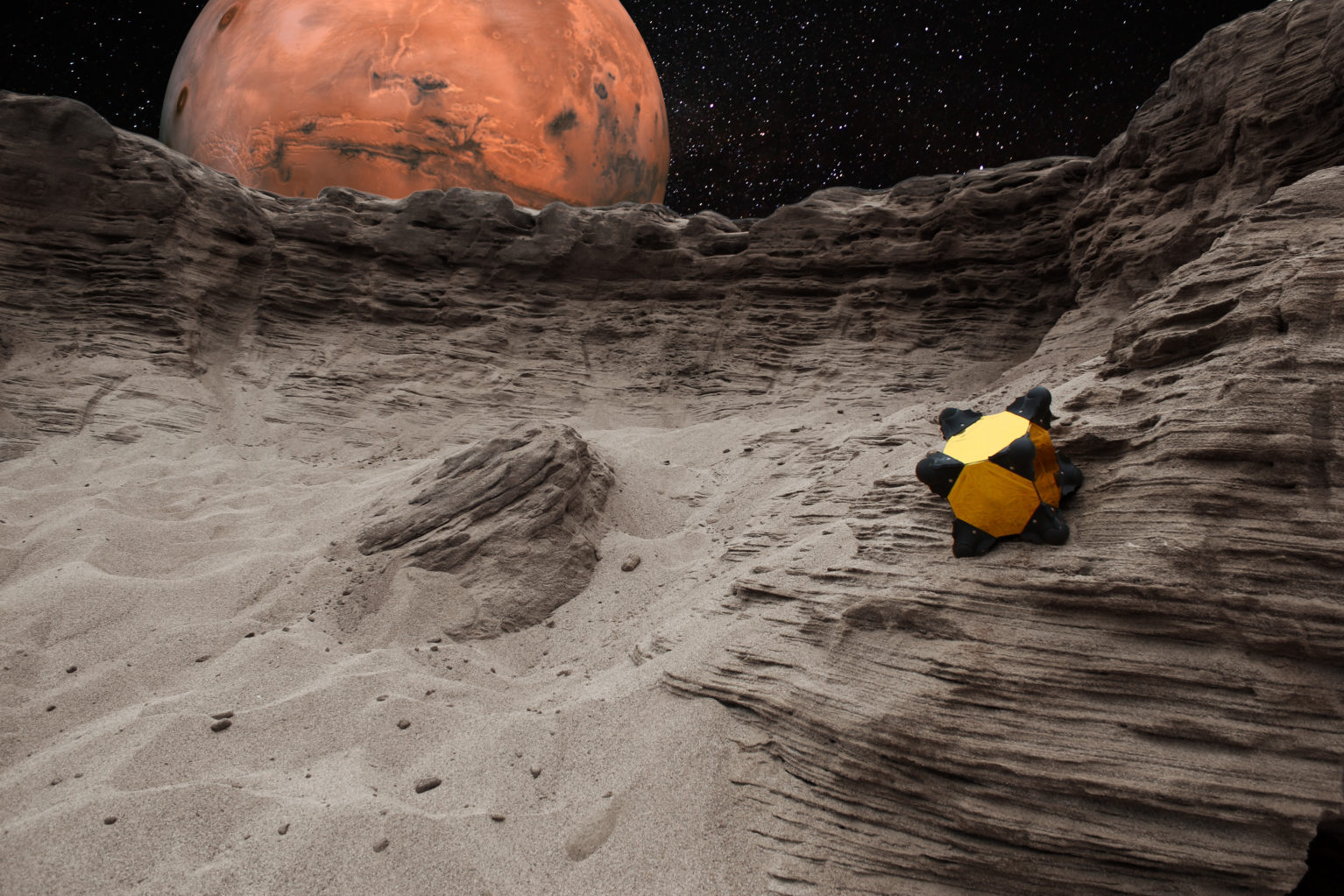Graphic depiction of cubic Hedgehog robot, a small yellow cube with black rounded corners, on the moon with Mars in the background.