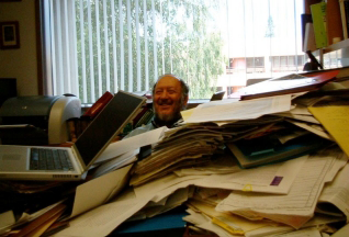Photo of Irv Weissman in his office.