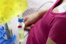 Photo of woman receiving chemotherapy.