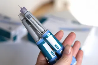 Stock photo  of two upscale hypodermic needles.