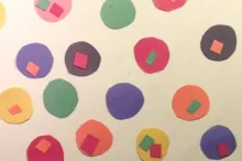 Screenshot from video of circles representing HIV strains.