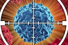 Graphic image of a cancer cell in target crosshairs.
