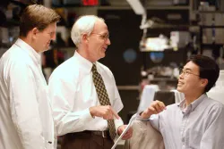 photo of Drs. Todd Brinton, Joseph Wu, and Paul Yock in the Clark Center