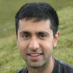 Headshot portrait of Amir Safavi-Naeini - Associate Professor of Applied Physics and (by courtesy) of Electrical Engineering