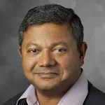 Headshot portrait of Arun Majumdar - Dean, Stanford Doerr School of Sustainability, Jay Precourt Professor, Professor of Mechanical Engineering, of Energy Science & Engineering, of Photon Science, (by courtesy) of Materials Sci & Eng and Senior Fellow (by courtesy) at Hoover