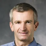 Headshot photo of Dr. Axel Brunger Professor of Molecular and Cellular Physiology, of Neurology, and of Photon Science at Stanford University