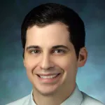 Headshot photo of a white male faculty member with short dark hair, Dr. Daniel Delitto, Assistant Professor of Surgery at Stanford University.