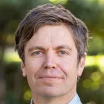 Headshot portrait of David Rehkopf - Professor of Epidemiology & Population Health, of Medicine (Primary Care and Population Health) and (by courtesy) of Pediatrics, of Health Policy and of Sociology