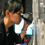 Headshot portrait of Eva Huang