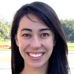 Photo of a smiling white female faculty member with long brown hair, Dr. Jennifer Brophy, Assistant Professor of Bioengineering at Stanford University.
