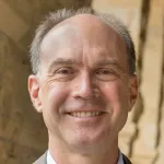 Headshot portrait of John Mitchell - Mary & Gordon Crary Family Professor in the School of Engineering, and Professor (by courtesy) of Electrical Engineering and of Education