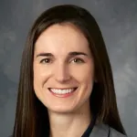 Photo of smiling white female faculty member, Dr. Julia Noel, Assistant Professor of Otolaryngology at Stanford University.