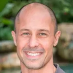 Headshot portrait of Kabir Peay - Senior Associate Dean for Education, Director of the Earth Systems Program, Professor of Biology, of Earth System Science and Senior Fellow at the Woods Institute for the Environment