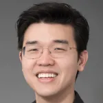 Headshot photo of a smiling male Asian faculty member, Dr. Kawin Setsompop, Associate Professor of Radiology at Stanford University.