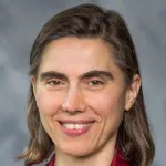 Photo of a smiling white female faculty member with shoulder-length light brown hair, Dr. Konstantina Stankovic, Professor of Otolaryngology at Stanford University.