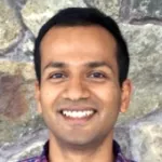 Headshot photo of smiling south Asian male faculty member, Dr. Kunal Mukherjee, Assistant Professor of Materials Science & Engineering at Stanford University.