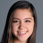 Photo of smiling female undergraduate student Sherry Mestan.