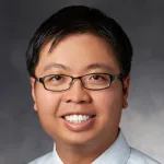 Headshot photo of a smiling Asian male faculty member, Dr. Paul Chang, Assistant Professor of Medicine at Stanford University.