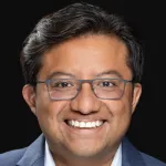 Photo of smiling Latino faculty member, Dr. Rogelio Hernandez Lopez, Assistant Professor of Bioengineering and Genetics at Stanford University.