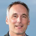 Headshot portrait of Julien Sage - Elaine and John Chambers Professor of Pediatric Cancer and Professor of Genetics