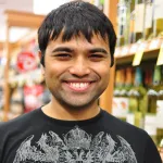 Headshot portrait of Samir Menon - Colella Family Fellow