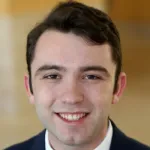 Photo of smiling male undergraduate student Tanner Scott.