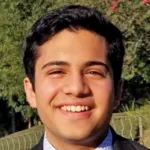 Photo of smiling male undergraduate student Arman Sharma.