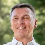 Headshot portrait of Siegfried Glenzer - Professor of Photon Science and (by courtesy) of Mechanical Engineering