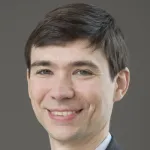 Photo of smiling white male faculty member with short brown hair, Dr. Steven Corsello, Assistant Professor of Medicine at Stanford University.