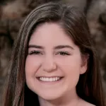 Photo of smiling female undergraduate student Jennifer Tashjian.
