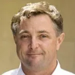 Headshot photo of smiling white male faculty member, Dr. Thomas Kenny, Professor of Mechanical Engineering at Stanford University.