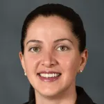 Indoor headshot photo of a smiling white female faculty member, Dr. Tina Baykaner, Assistant Professor of Medicine at Stanford University.
