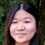 Photo of smiling female undergraduate student Alice Wang.