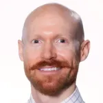 Headshot photo of a smiling whilte male faculty member with a moustache and beard, Dr. William Goodyer, Assistant Professor of Pediatrics at Stanford University.