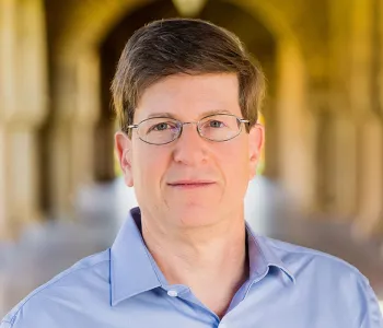 Mark Schnitzer standing outdoors at Stanford