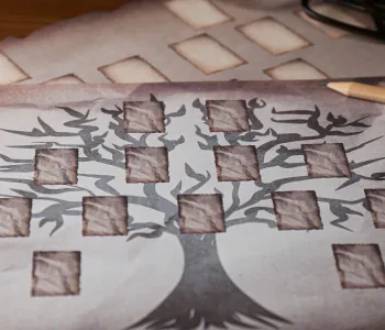 Image of a family tree document with blank squares.