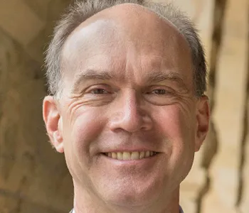 Headshot portrait of John Mitchell - Mary & Gordon Crary Family Professor in the School of Engineering, and Professor (by courtesy) of Electrical Engineering and of Education