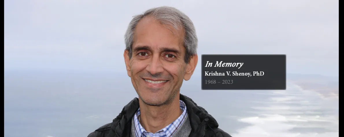 Image of Dr. Krishna Shenoy outdoors, smiling at the camera, with text reading "In Memory: Dr. Krishna V. Shenoy, 1968-2023."