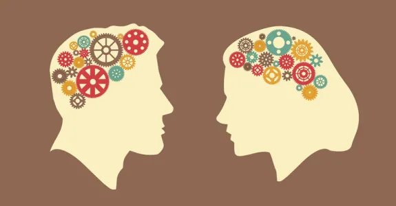 Graphic illustration of two heads in profile facing each other, one designed to look male with short hair and one female with long hair, with colorful gears inside the area where their brains would be.