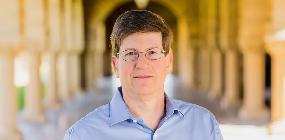 Mark Schnitzer standing outdoors at Stanford