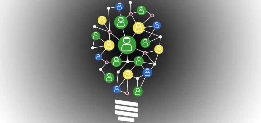 Graphic image of lightbulb composed of different icons of people to indicate crowdsourced idea.