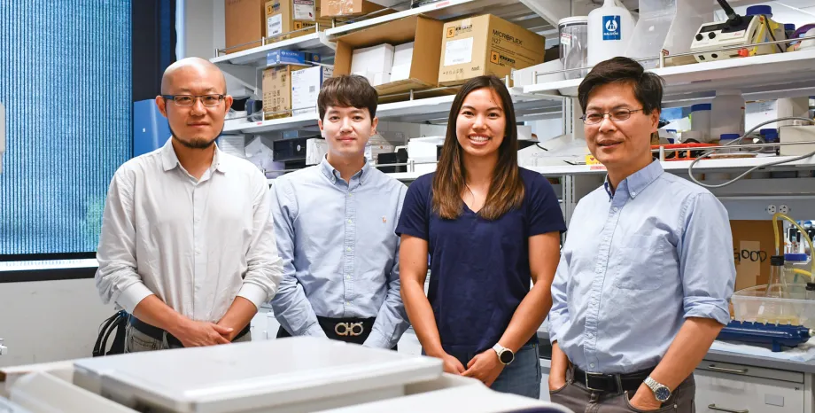 Photo of the 4 researchers inside the lab.