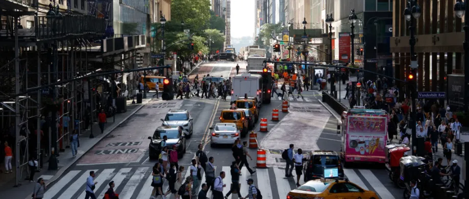 Photo of a busy crosswalk in New York City.
