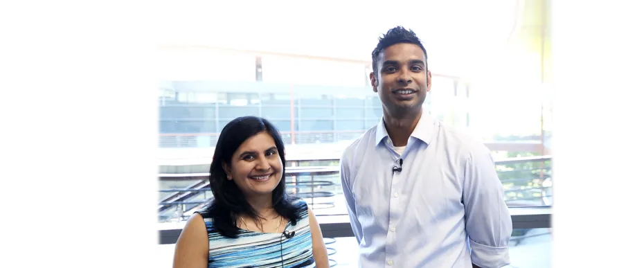 Photo of Drs. Nidhi Bhutani and Ovijit Chaudhuri standing together at the Clark Center.