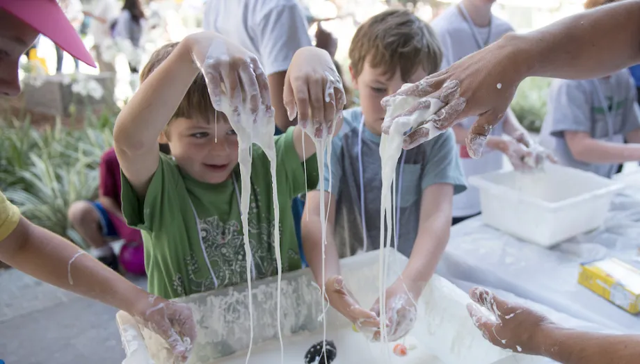 Kids play with cornstarch slurry.